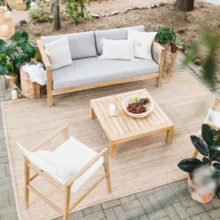 Honeybloom Park City Blonde Acacia Wood Outdoor Coffee Table -Accent Aura Furniture Store honeybloom park city blonde acacia wood outdoor coffee table 2